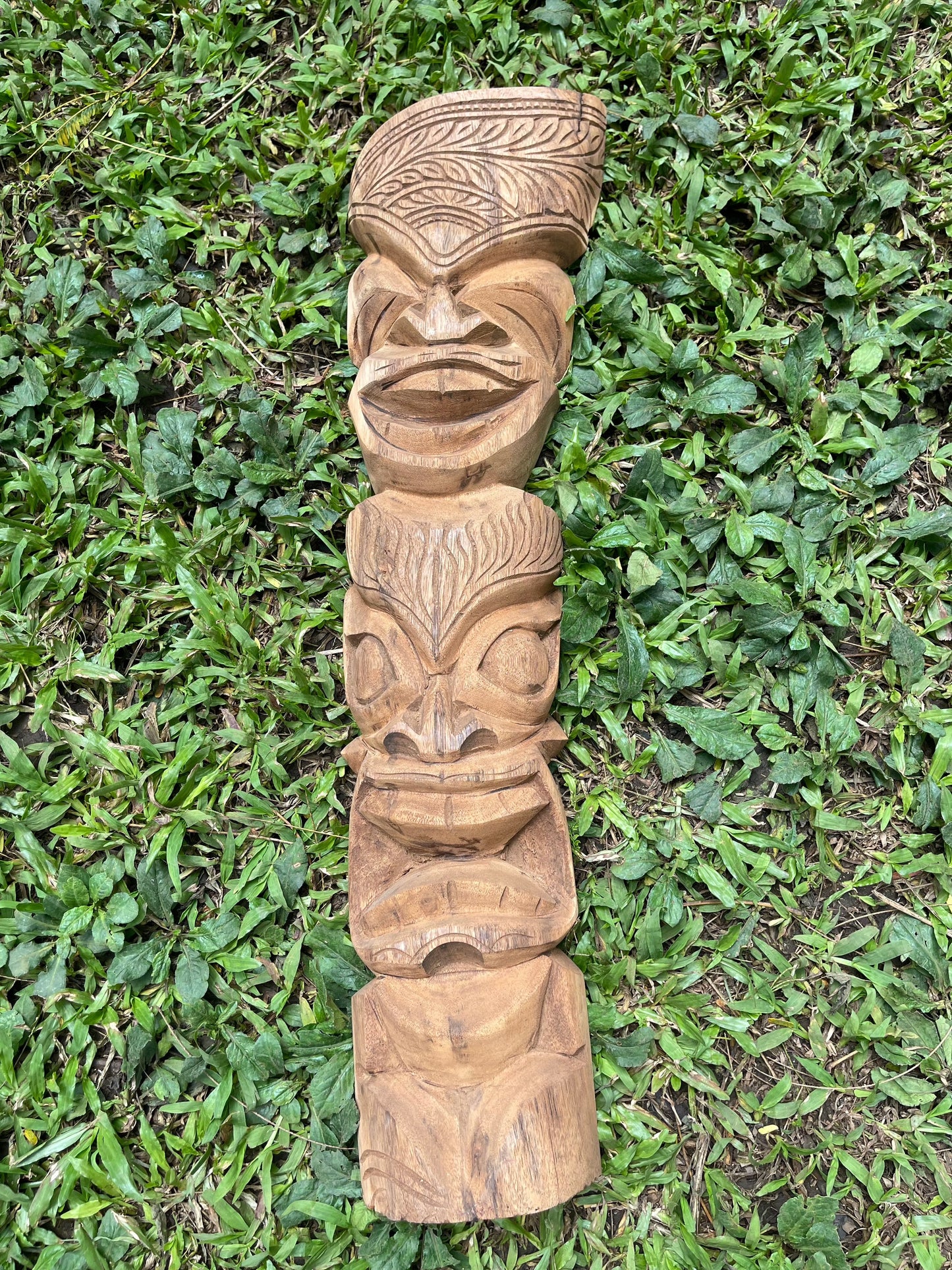 Hand-Carved Totem Tiki Representing Happiness and Safety